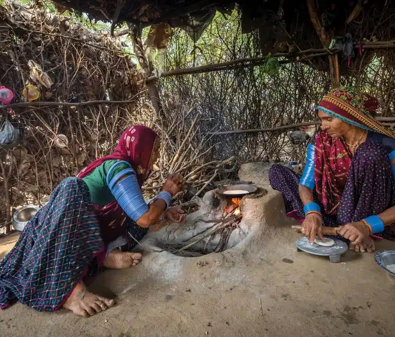Two Rabari women cooking in Bera.